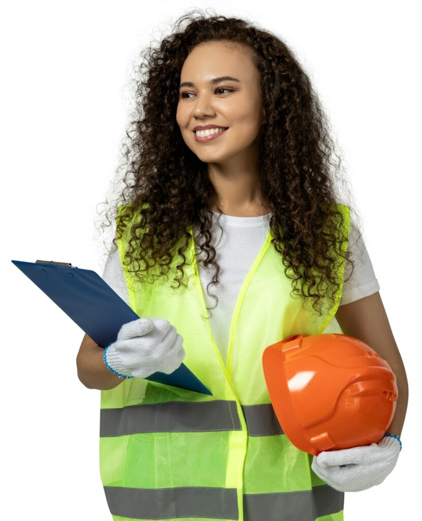A girl in the form of a builder, isolated on white background